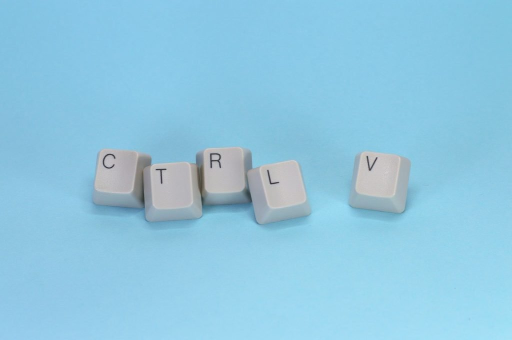 Ctrl + v keyboard keys.