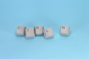 Computer keyboard keys spell out "ctrl."